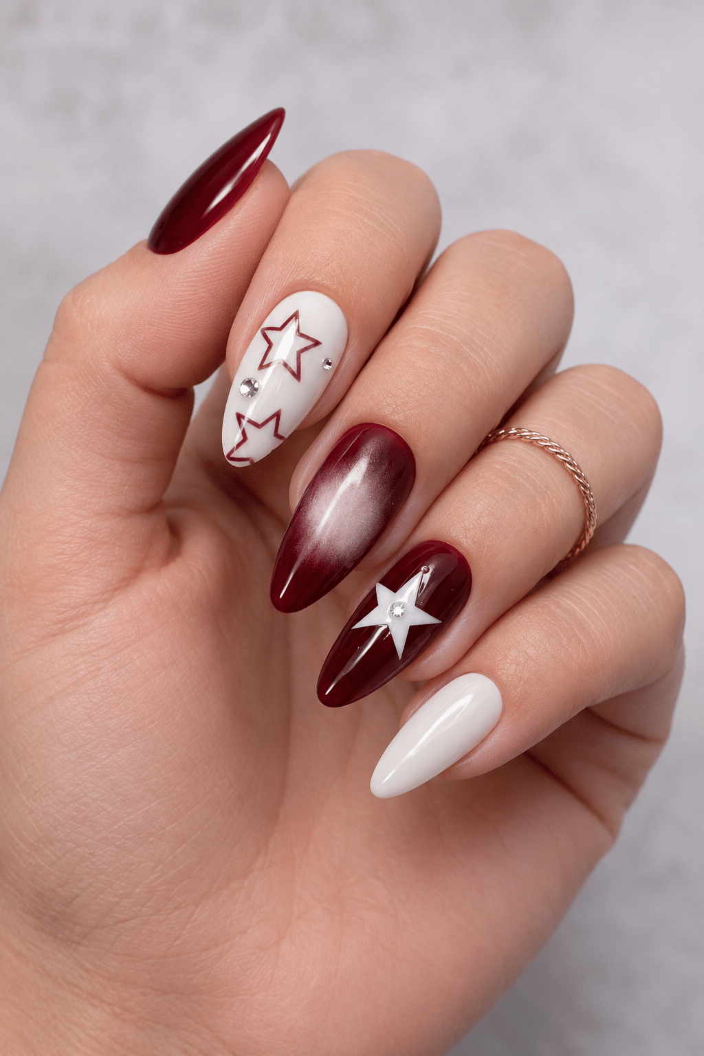 Burgundy Star Nails With White Stars and Cat-Eye Shine 3 Burgundy Star Nails