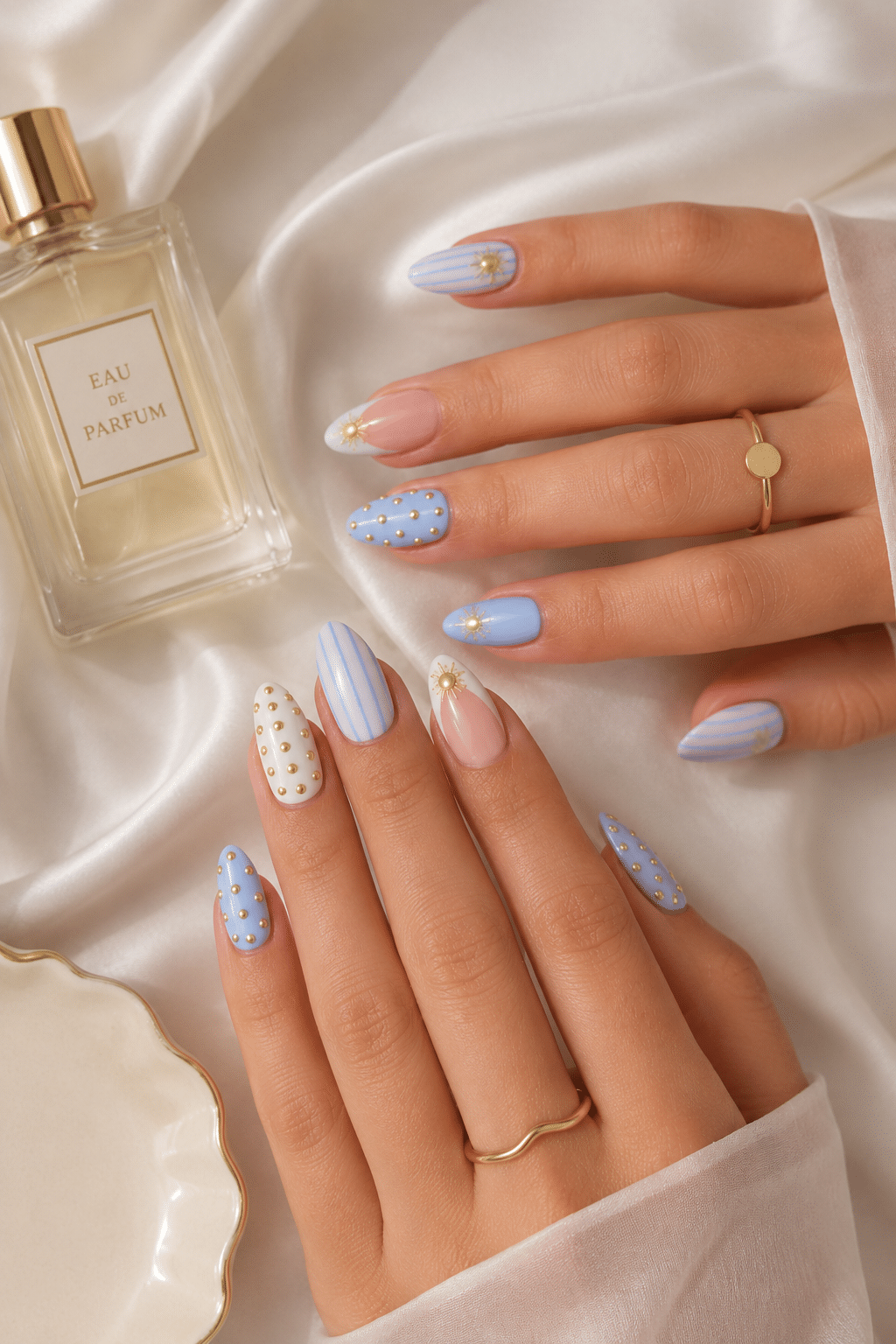 Soft Blue Sunburst Nail Ideas for an Elegant Gold-Accent Manicure 3 soft blue sunburst nail ideas