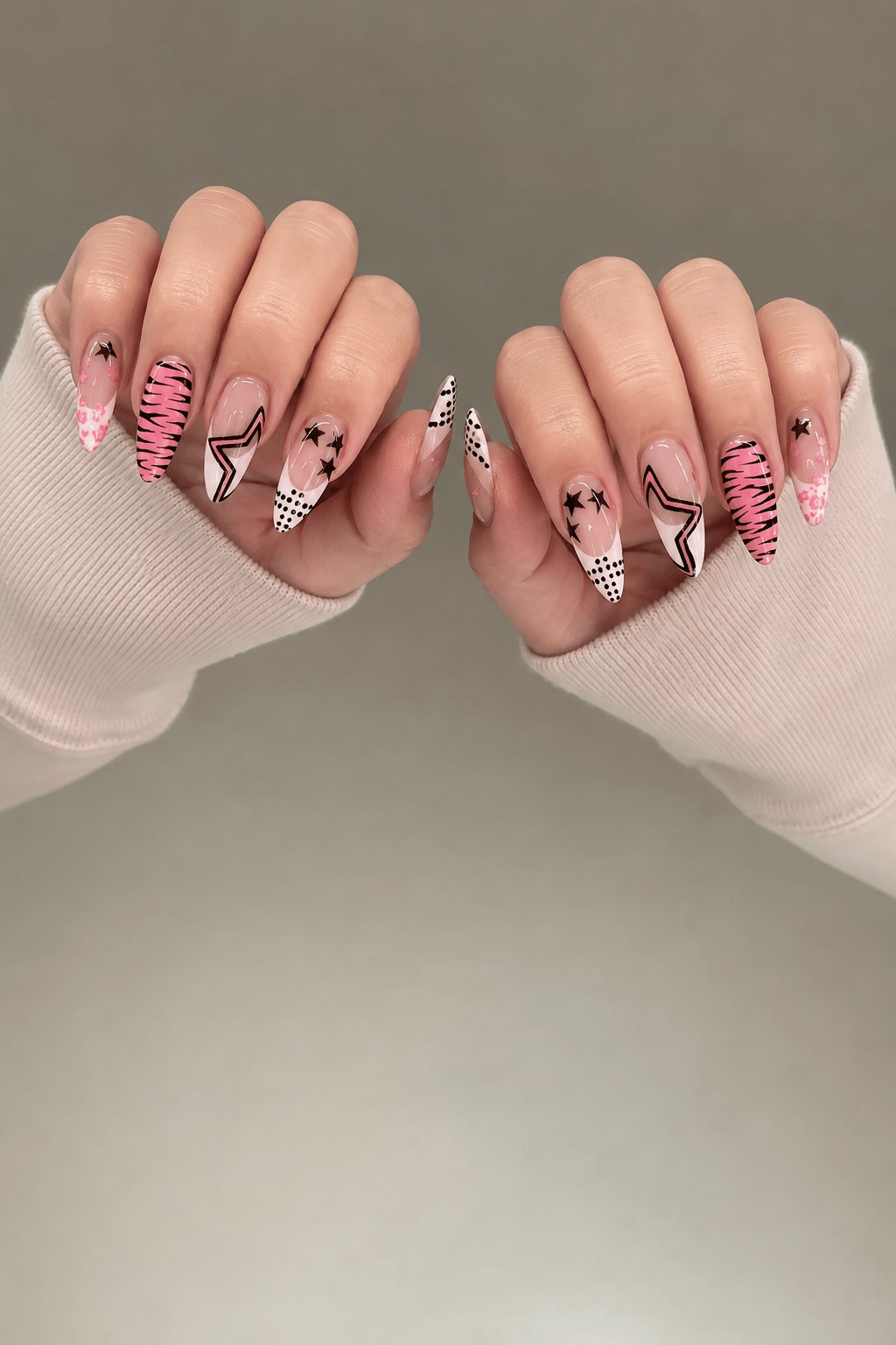 Pink Zebra Star Nails for Bold Y2K Nail Inspiration 2 Pink zebra star nails