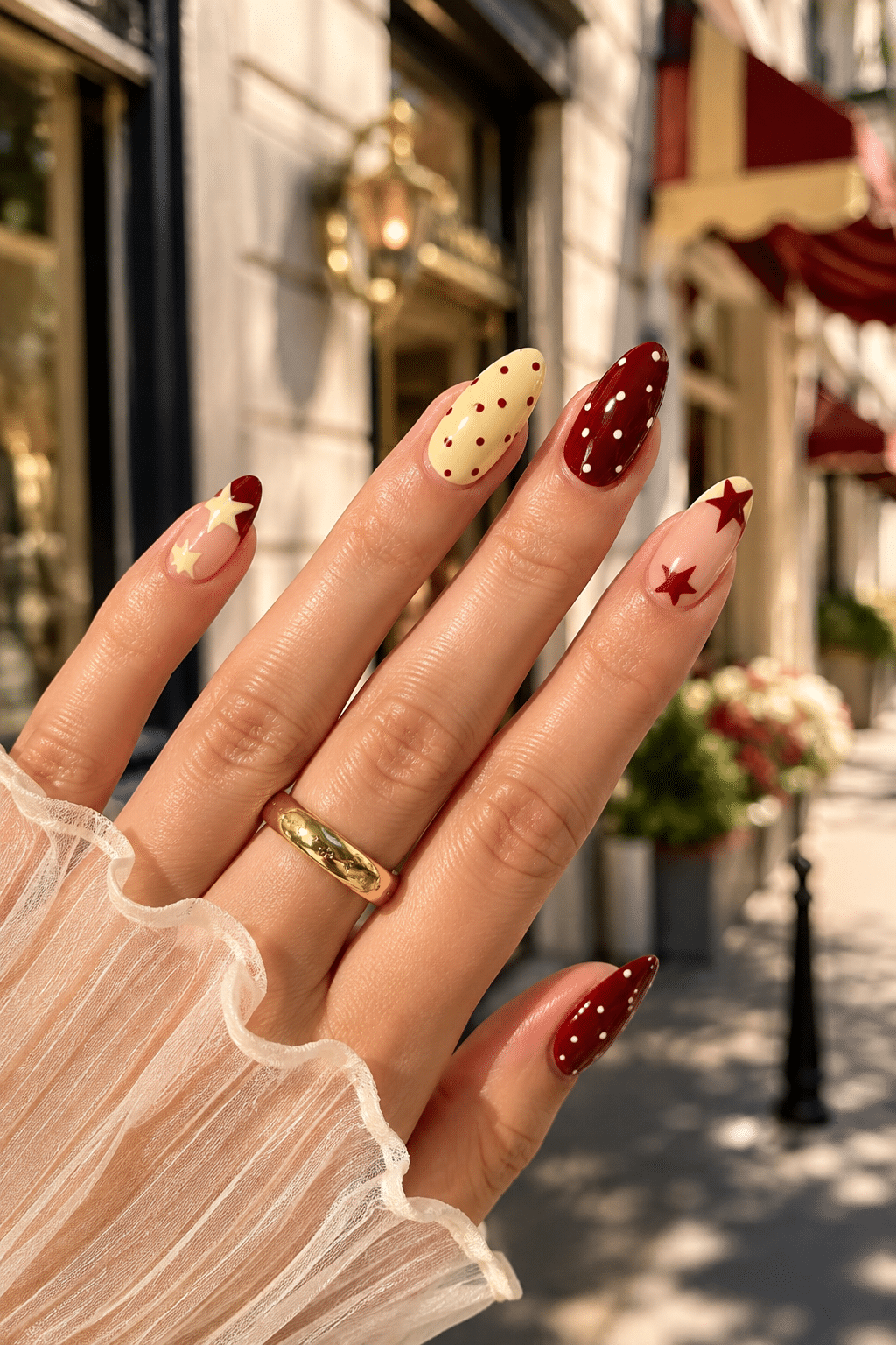 Burgundy star nail ideas
